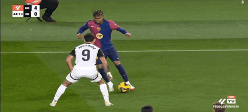 a soccer player with the number 16 on his back is surrounded by two other players