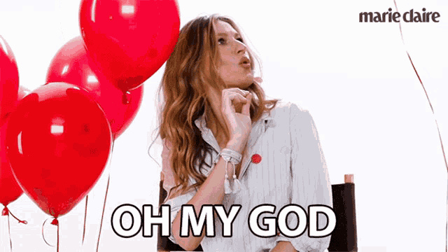 a woman with red balloons and the words oh my god