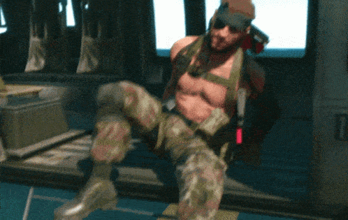 a man in a military uniform without a shirt is standing in a room
