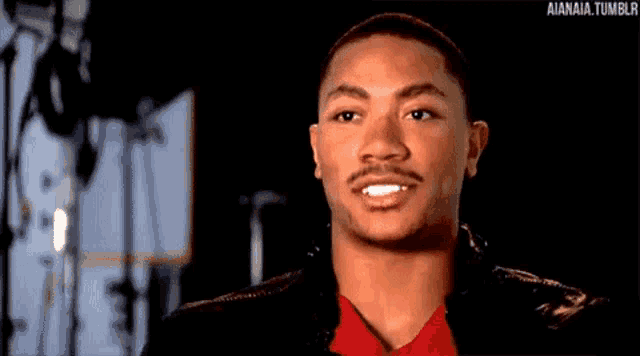 a close up of a man 's face with the words aiania tumblr at the bottom