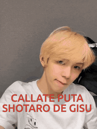 a young man with blonde hair is wearing a white shirt that says callate puta shotaro de gisu on it