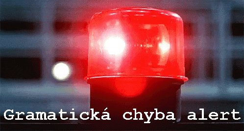 a red light with the words " grammaticka chyba alert " underneath it