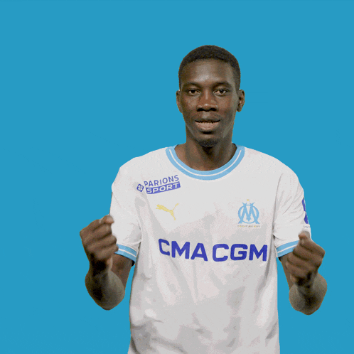 a man wearing a shirt that says cma cgm