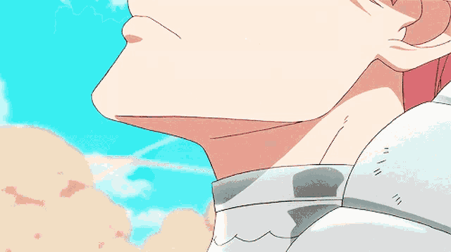 a close up of a person 's face with a blue sky behind them