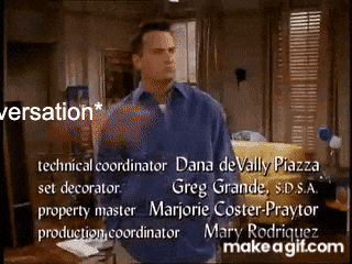 a man in a blue shirt is standing in a living room with the words " dana de vally piazza set decorator " on the top