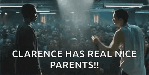 two men are standing next to each other in front of a crowd with the words clarence has real nice parents !