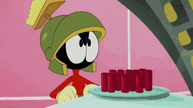 a cartoon character named marvin the martian looks at a plate of red tubes