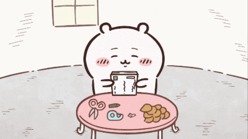 a cartoon of a bear sitting at a table holding a box