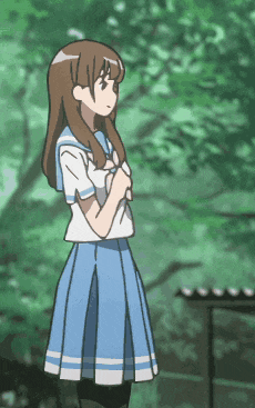 a girl in a blue and white skirt stands in a forest