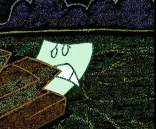 a piece of paper with a sad face on it