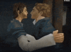 a man and a woman kissing in a dark room