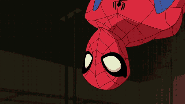 a cartoon spider man is hanging upside down from a ceiling