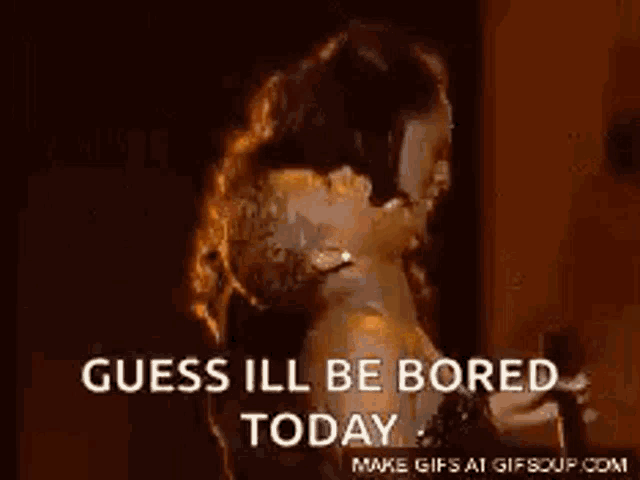 a woman is dancing with a man and says `` guess i 'll be bored today ''
