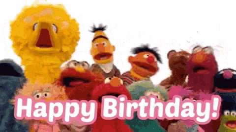a group of sesame street characters are standing next to each other with the words `` happy birthday ! ''