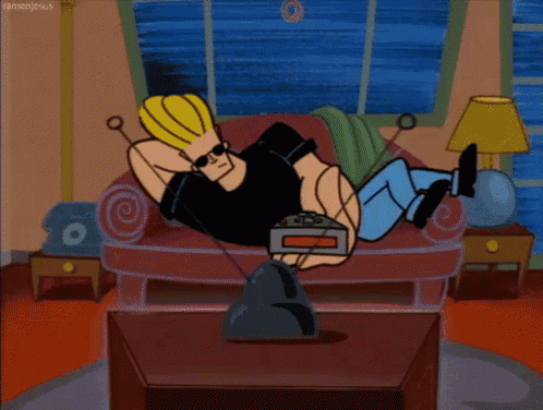 a cartoon character is laying on a couch watching tv