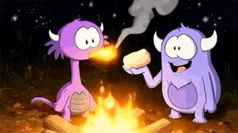 two cartoon monsters are sitting around a campfire eating toast