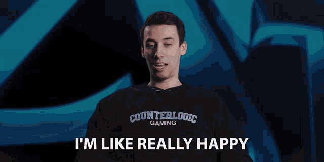 a man wearing a counterlogic gaming sweatshirt says he is really happy
