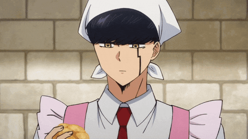 a man with a bandana on his head is holding a piece of bread