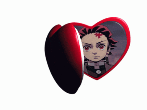 a red and white heart shaped item with a picture of a boy on it