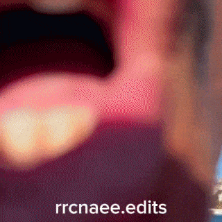 a close up of a person 's mouth with the website rrcnaee.edits written below it