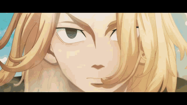 a close up of a blonde haired anime character