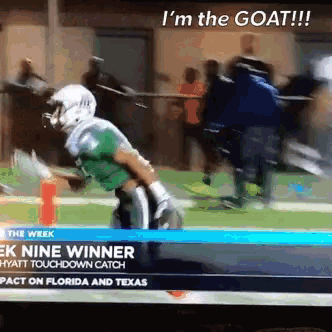 a tv screen shows a football game between florida and texas with the headline " i 'm the goat "