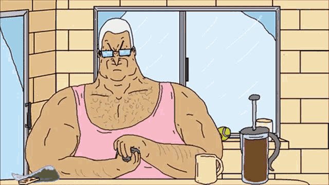 a man in a pink tank top sits at a table with a coffee pot