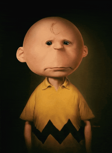 a cartoon character with a sad look on his face is named charlie brown