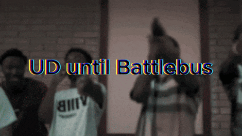 a group of men singing into microphones with the words ud until battlebus written above them