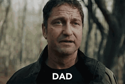 a close up of a man 's face with the word dad below it