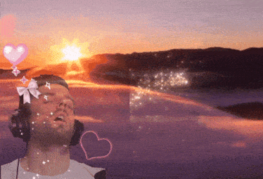 a man wearing headphones and a bow on his head looks at the sunset