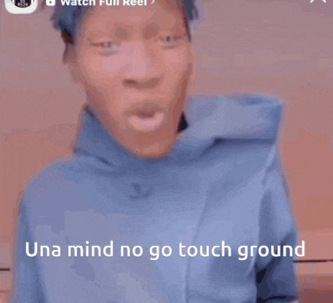a man with blue hair is wearing a blue hoodie and says una mind no go touch ground .