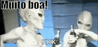 a couple of aliens are standing next to each other holding bottles of coke .