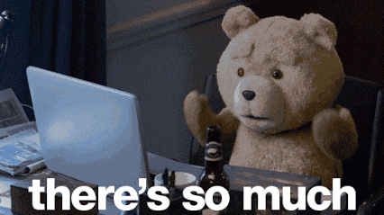 a teddy bear sitting in front of a laptop with the words " there 's so much " on the bottom