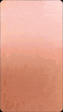 a copper colored surface with a lot of small dots