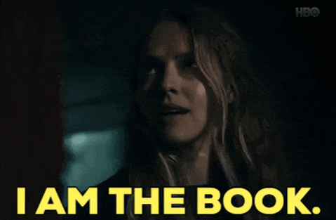 a woman with long hair says i am the book in yellow letters