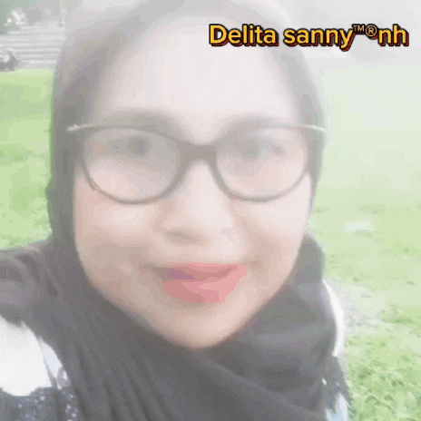a woman wearing glasses and a black scarf is named delta