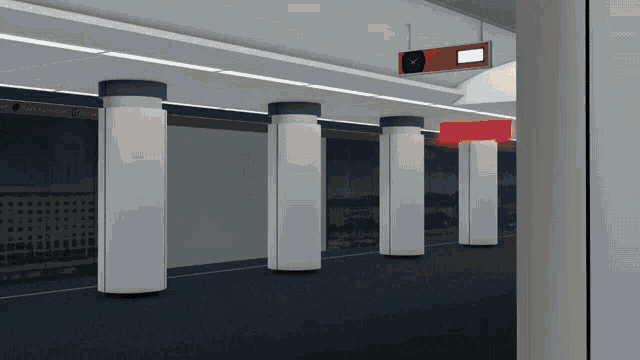 a subway station with columns and a sign that says ' a ' on it