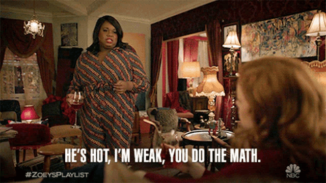 a woman says he 's hot i 'm weak you do the math while standing in a living room