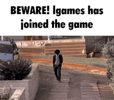 a man in a suit walks down a sidewalk with the words beware igames has joined the game above him