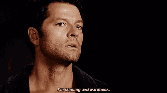 a man says i 'm sensing awkwardness in a black background