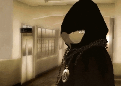 a person in a black hooded jacket is standing in a hallway with a sign that says 3 on it