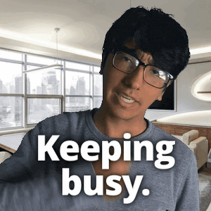a man wearing glasses and a shirt that says " keeping busy "