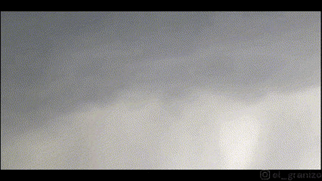 a pixelated image of a cloudy sky with the watermark el_granizo