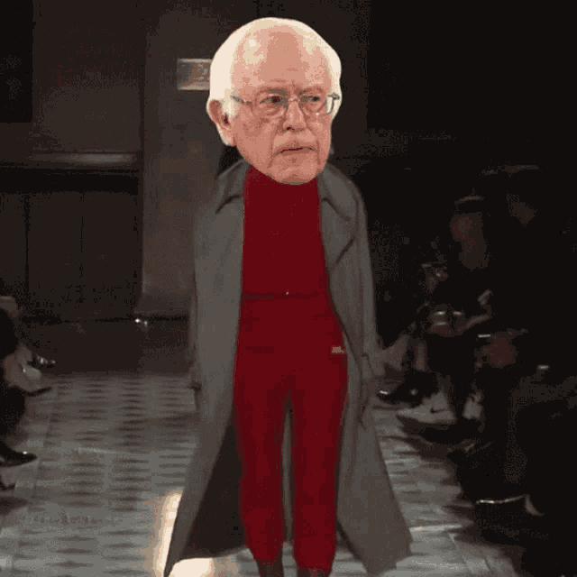 a mannequin with a big head of bernie sanders walking down the runway
