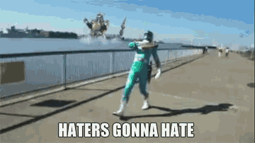 a green power ranger says haters gonna hate while dancing