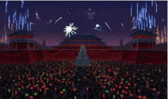 a crowd of people are watching fireworks in front of a large building