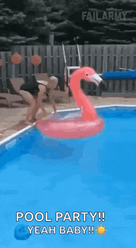 a woman is jumping into a pool with a flamingo float .