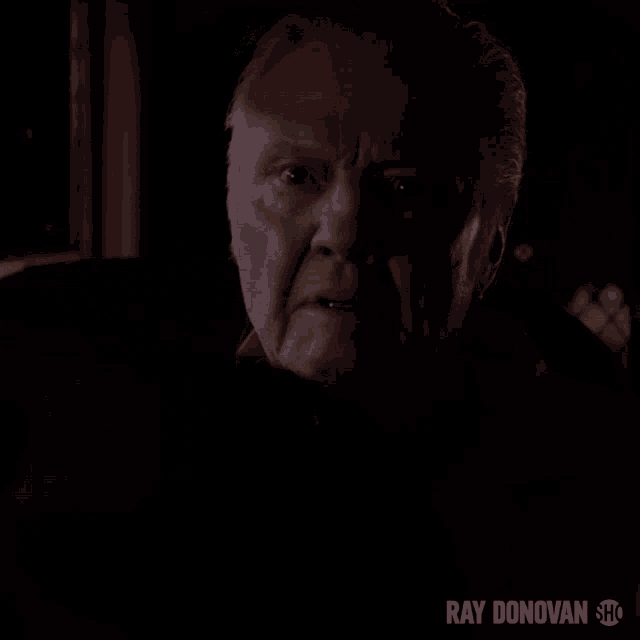 a close up of a man 's face with ray donovan show written below it