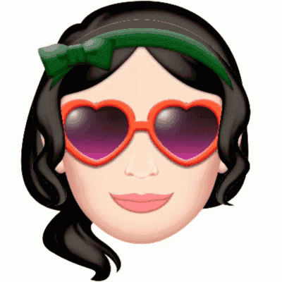 a woman wearing heart shaped sunglasses and a green bow
